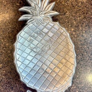 brushed silver tone cast aluminum pineapple-shaped trivet or serving tray
